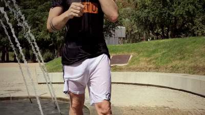 wet-in-public-fountain-and-muddy-sneaker