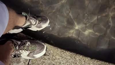 wet-in-public-fountain-and-muddy-sneaker