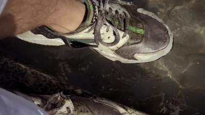 wet-in-public-fountain-and-muddy-sneaker